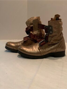 Fly London 'Stif' moto boots a metallic gold finish, adjustable buckle straps